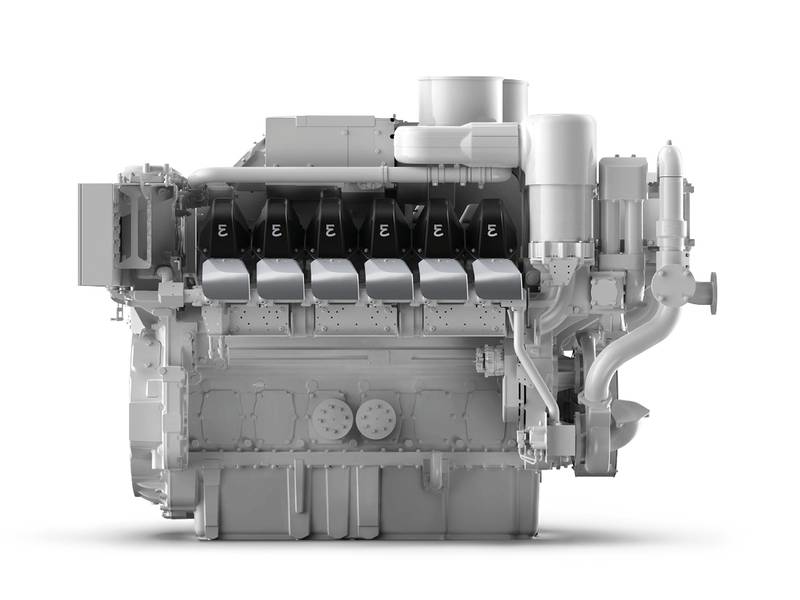 A large marine engine undergoing testing in a facility.